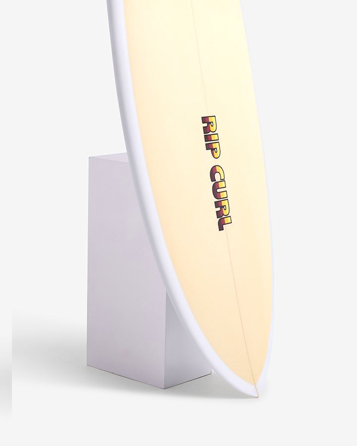 Rip Curl Twin surfboard in natural finish